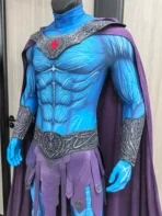 Masters of the Universe Skeletor cosplay costume front view, blue bodysuit with skull mask, purple hood and Havoc Staff