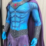 Masters of the Universe Skeletor cosplay costume front view, blue bodysuit with skull mask, purple hood and Havoc Staff